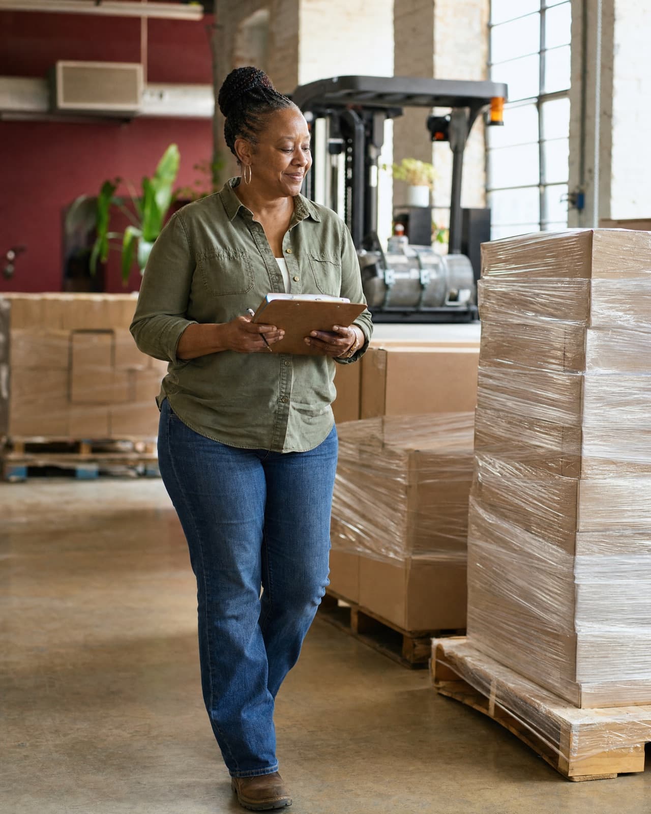 A wholesale business owner in the warehouse